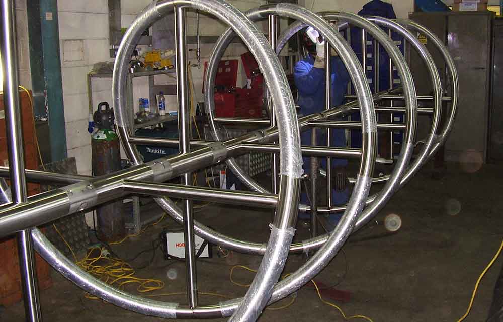 Architectural metal fabrication for earthquake resistance