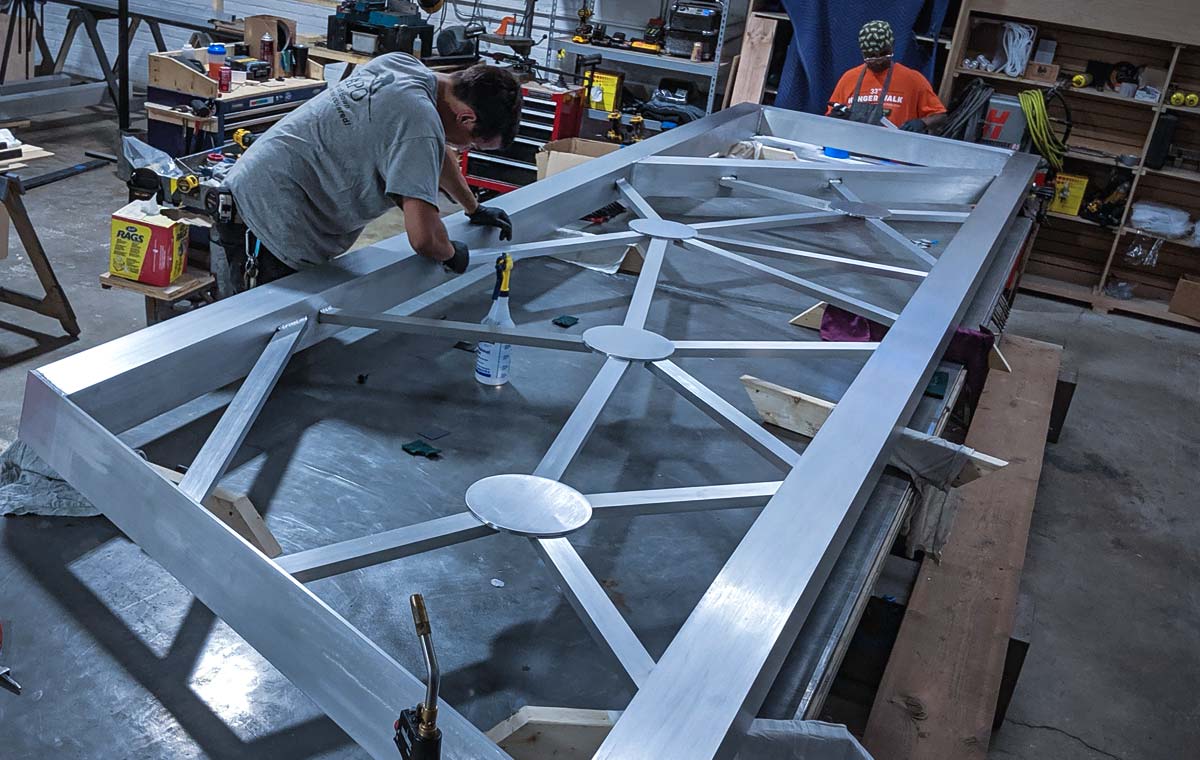 Architectural metal fabrication for libraries
