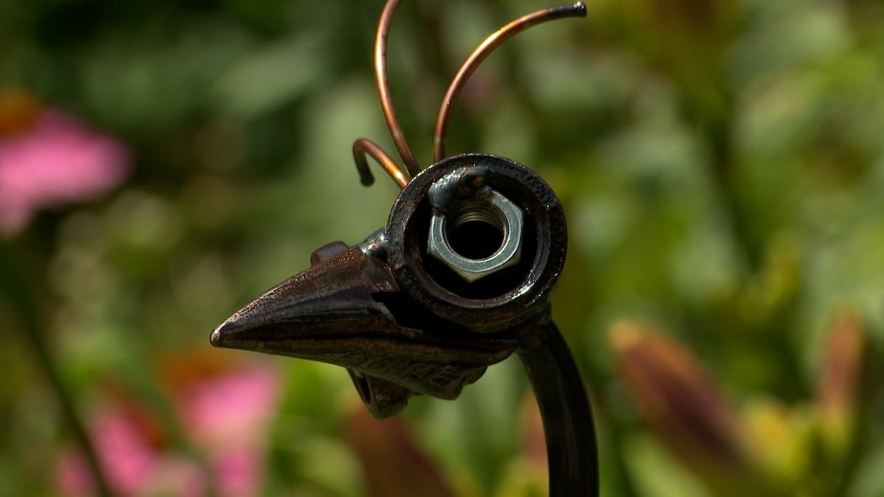 garden art made from auto parts