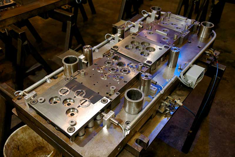 how to choose between transfer and progressive stamping Transfer vs. Progressive Stamping: How to Choose the Best