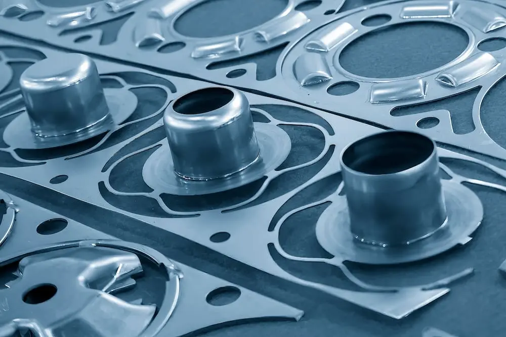 impact of material hardness on punch life Impact of Material Hardness on Punch Life in Stamping